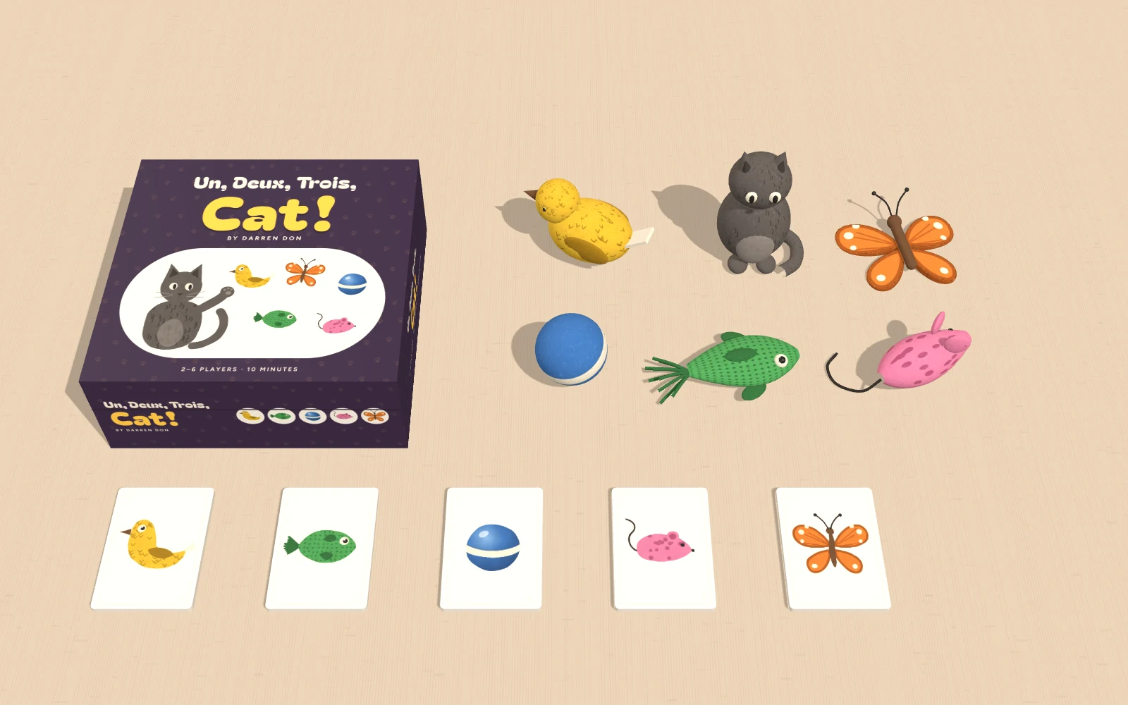 The box, the six felt toys and sixty cards as five piles of twelve.
